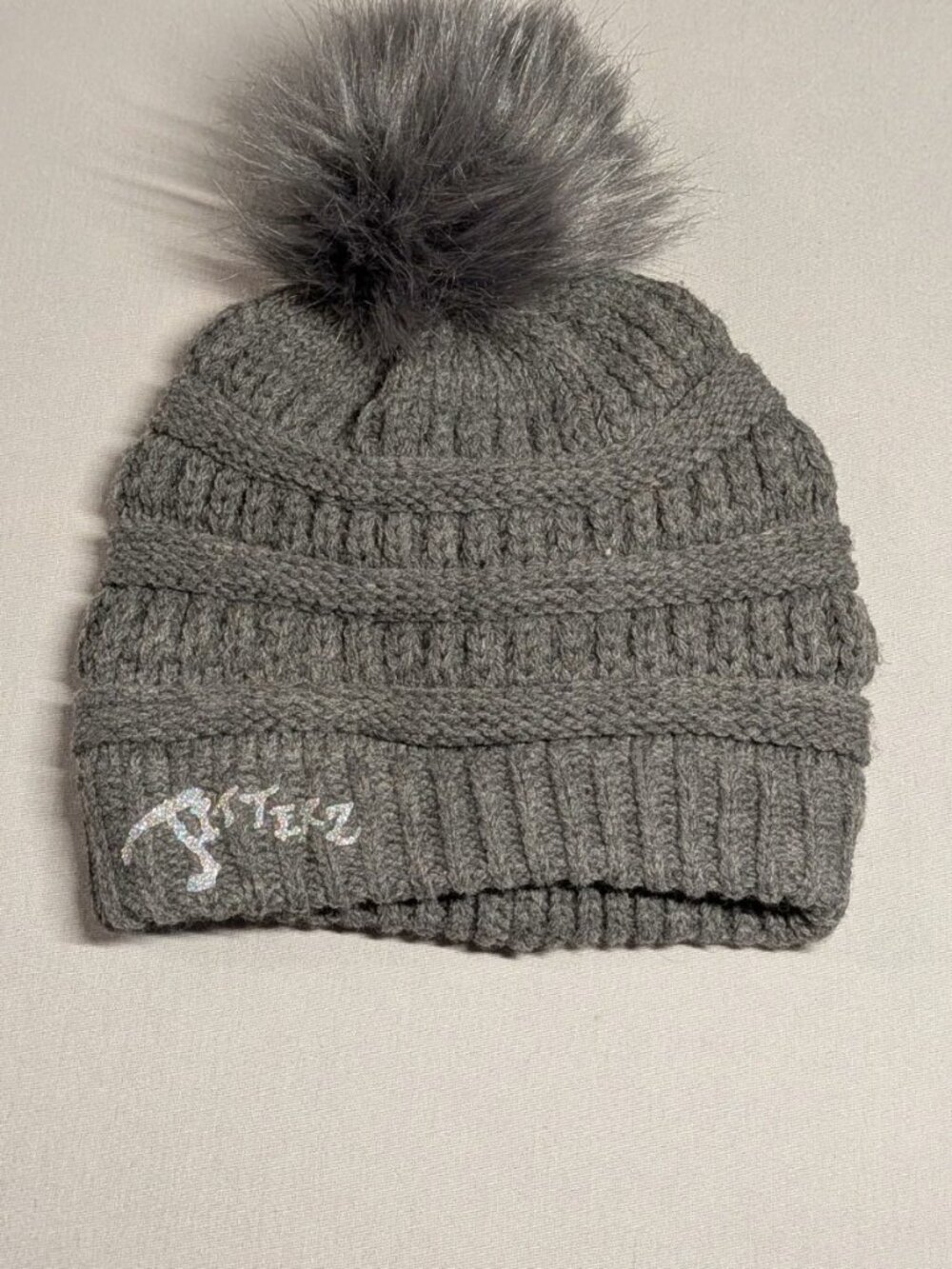 Jitterz Soft Gray Colored Beanie Hat With Faux Fur Ball